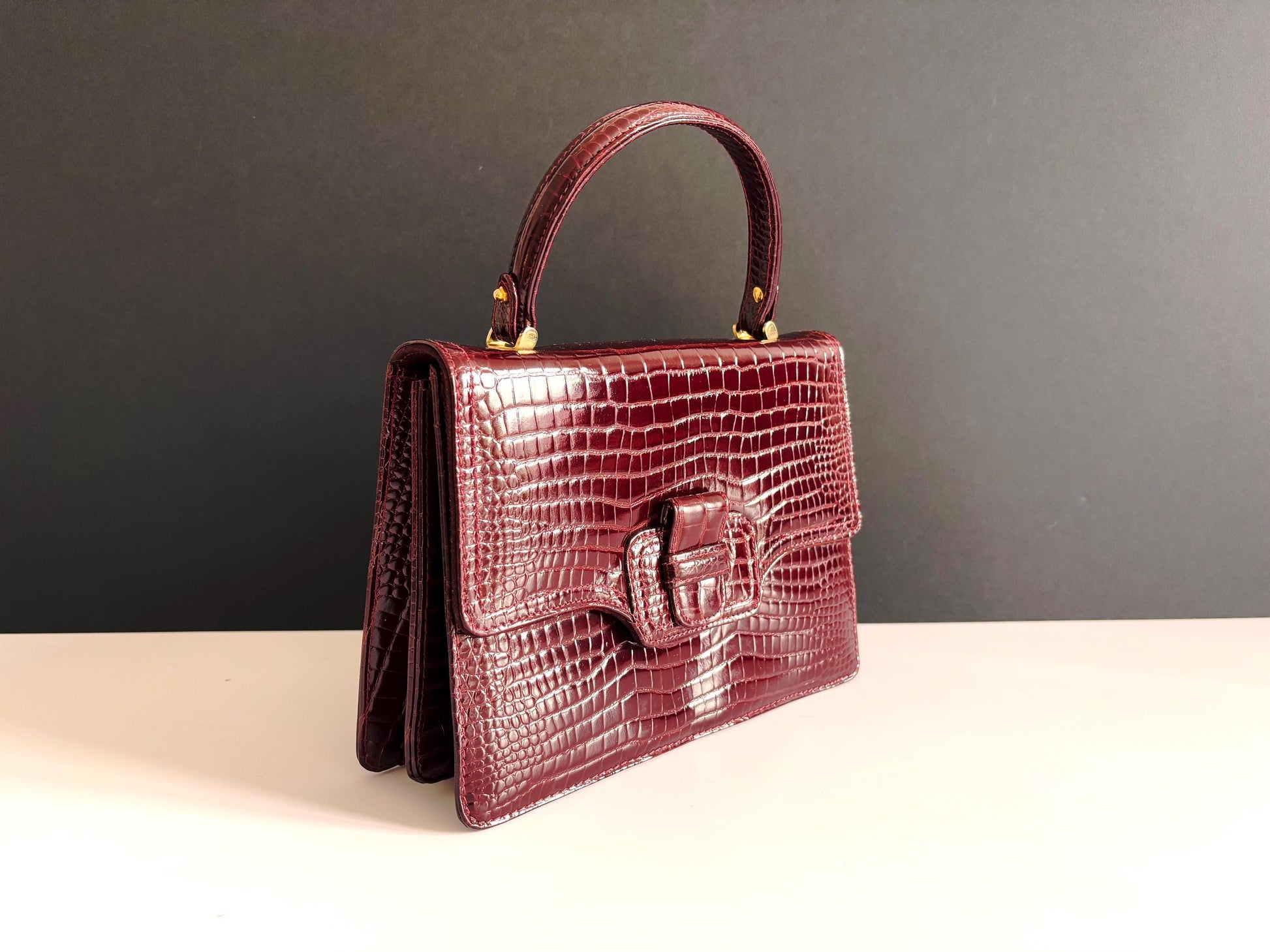 Vintage burgundy patent leather top handle bag , very good condition, late 70's