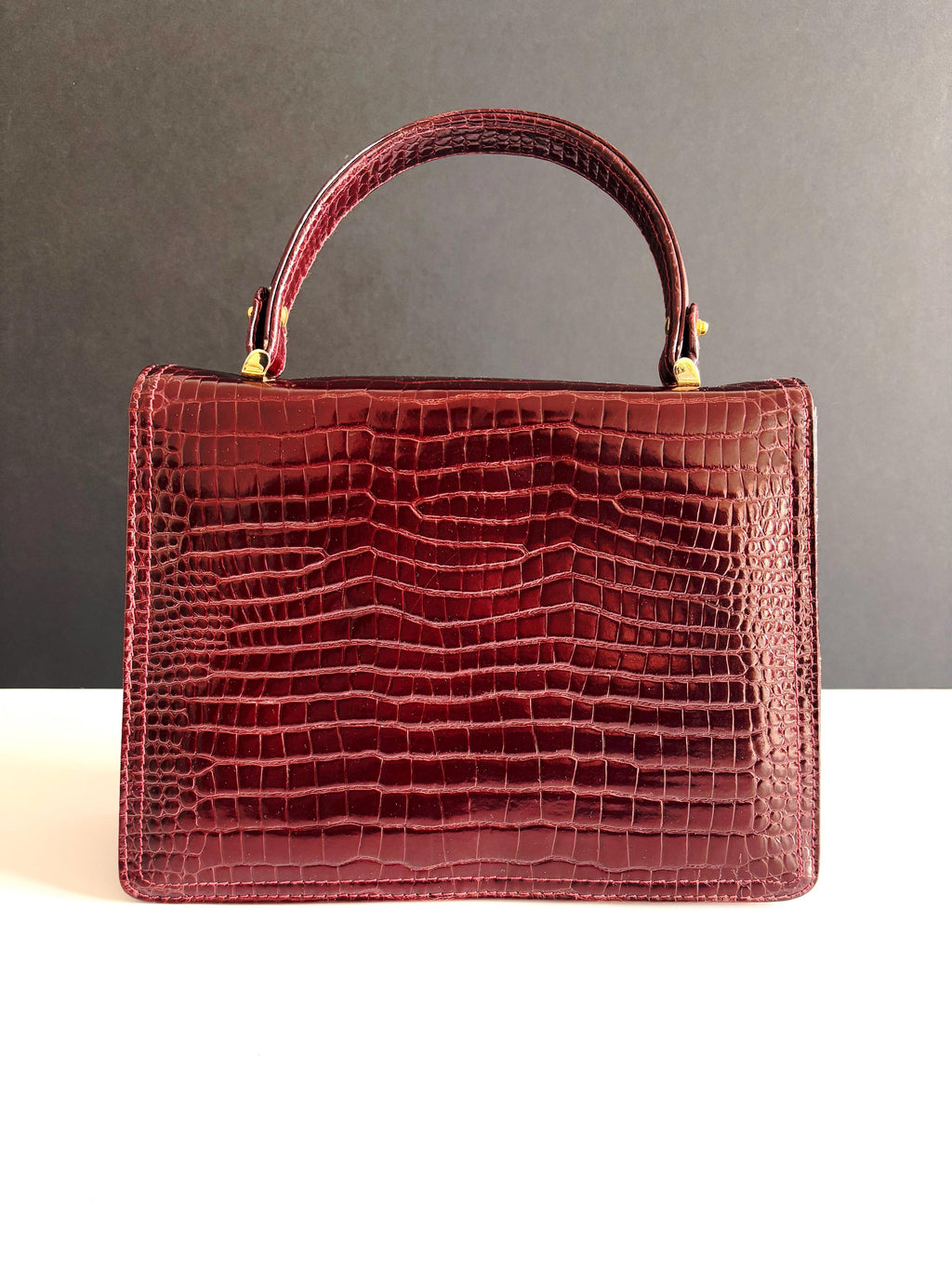 Vintage burgundy patent leather top handle bag , very good condition, late 70's