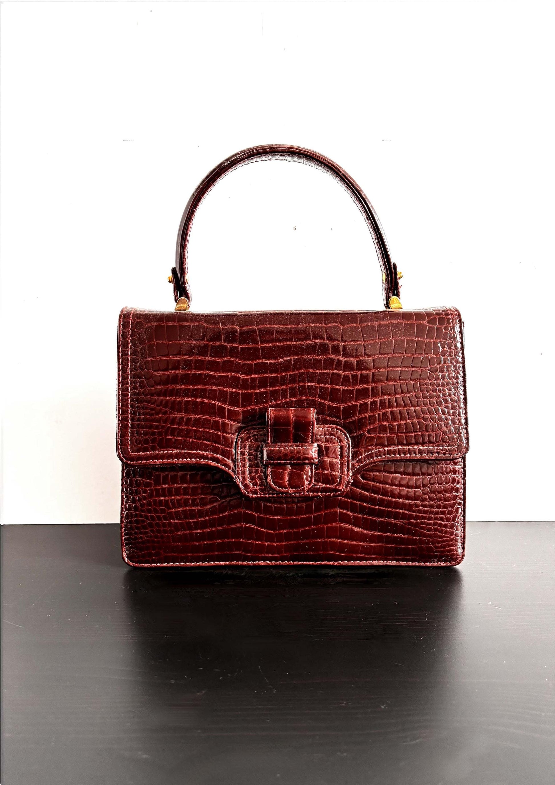 Vintage burgundy patent leather top handle bag , very good condition, late 70's